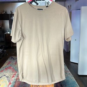 Cuts curve hem gold/beige short sleeve shirt